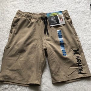 New with tags. Boys Hurley shorts size 10/12. Tan.